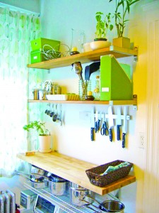 Install a shelf system on an unused kitchen wall -- using modular, customizable shelving units can expand your storage and display space. (photo courtesy of Rigid Kitchen)