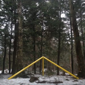 Image Description: Michael Zebrowski Sunrise Sunset and Level , Installation image, 2016 A series of transits a tool used by surveyors custom fabricated and installed at Spruce Peak in Stowe, VT Materials: Wood, steel, safety yellow paint, rotary lasers, time lapse cameras.