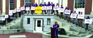 Nancy Sterns Bercaw, author and Alzheimer's advocate, addresses the crowd at The Longest Day Rally on Church Street in Burlington. (Courtesy Photo)